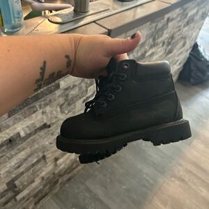 Black Timberland laced boots